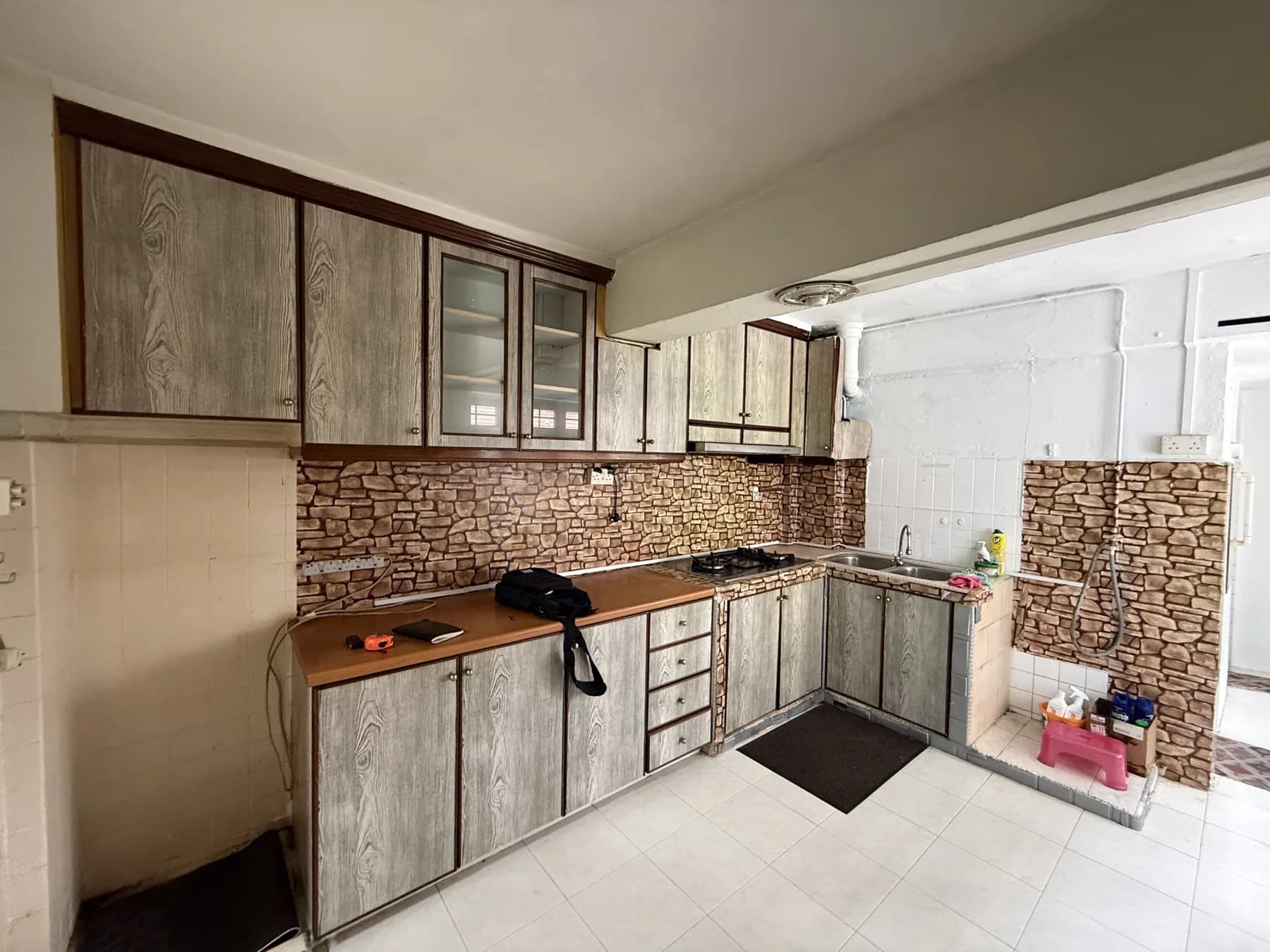 Original concrete kitchen cabinet and finishes before renovation
