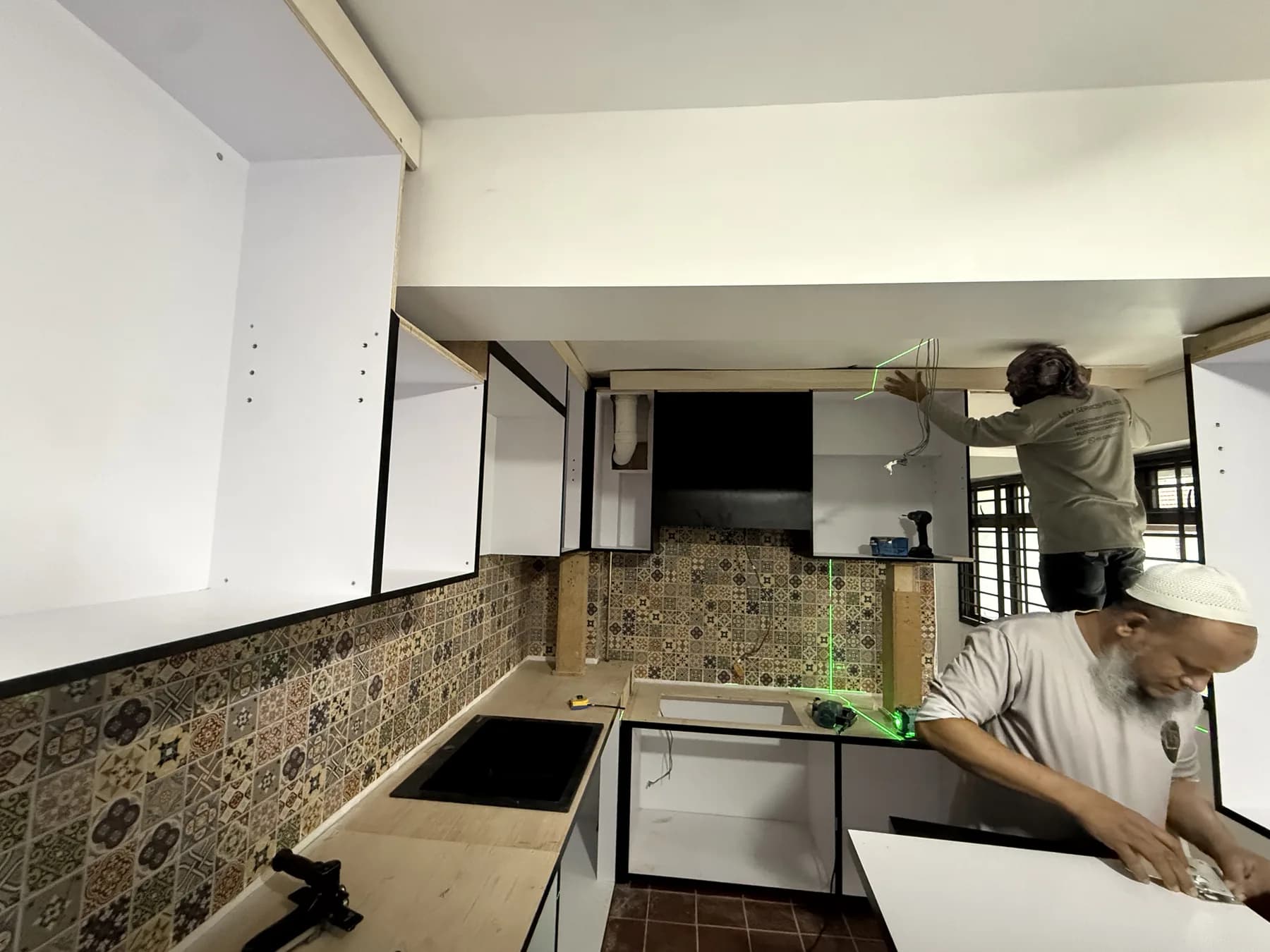 Kitchen cabinet installation in progress