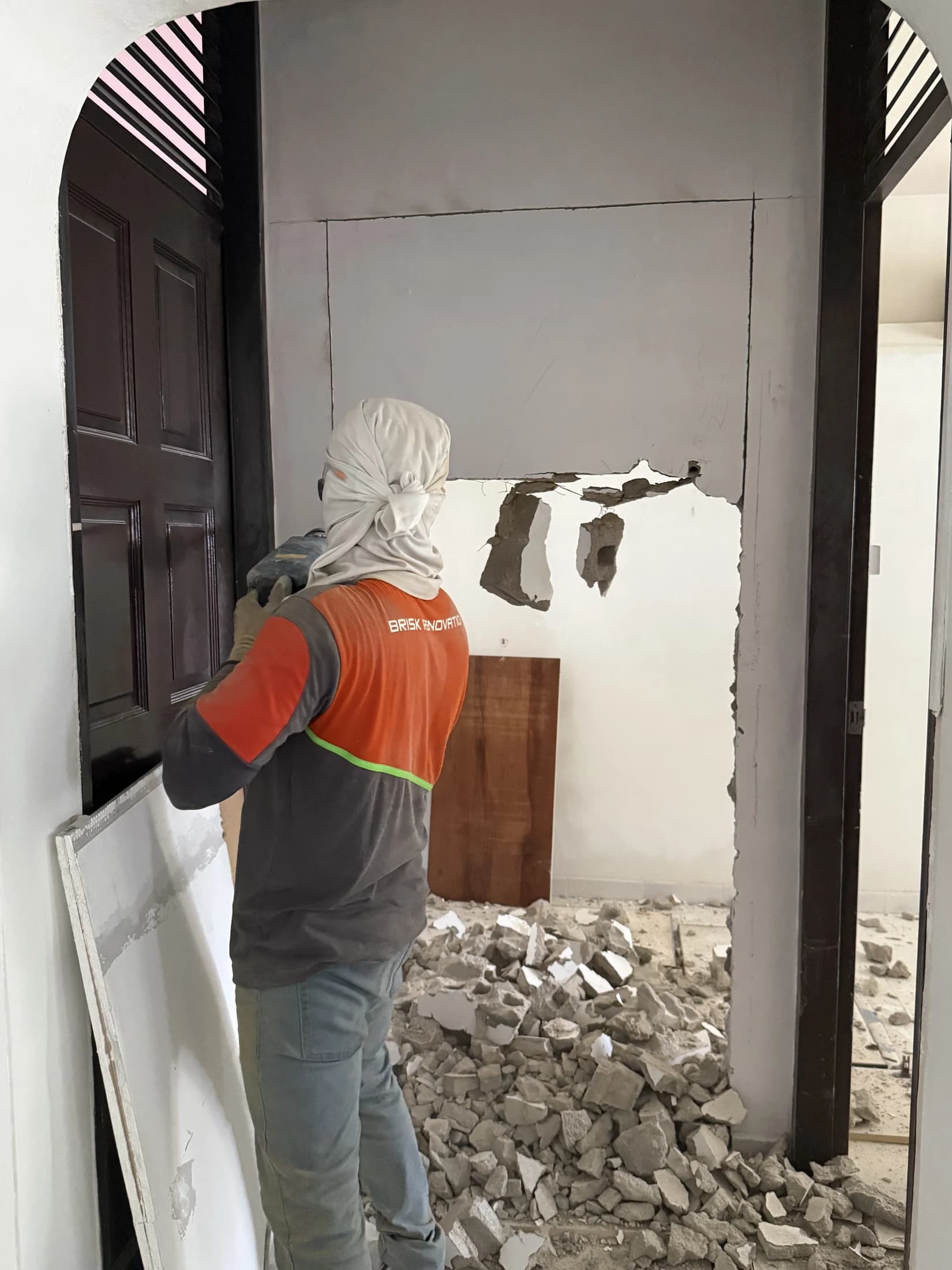 Storeroom wall hacking in progress between the bedrooms