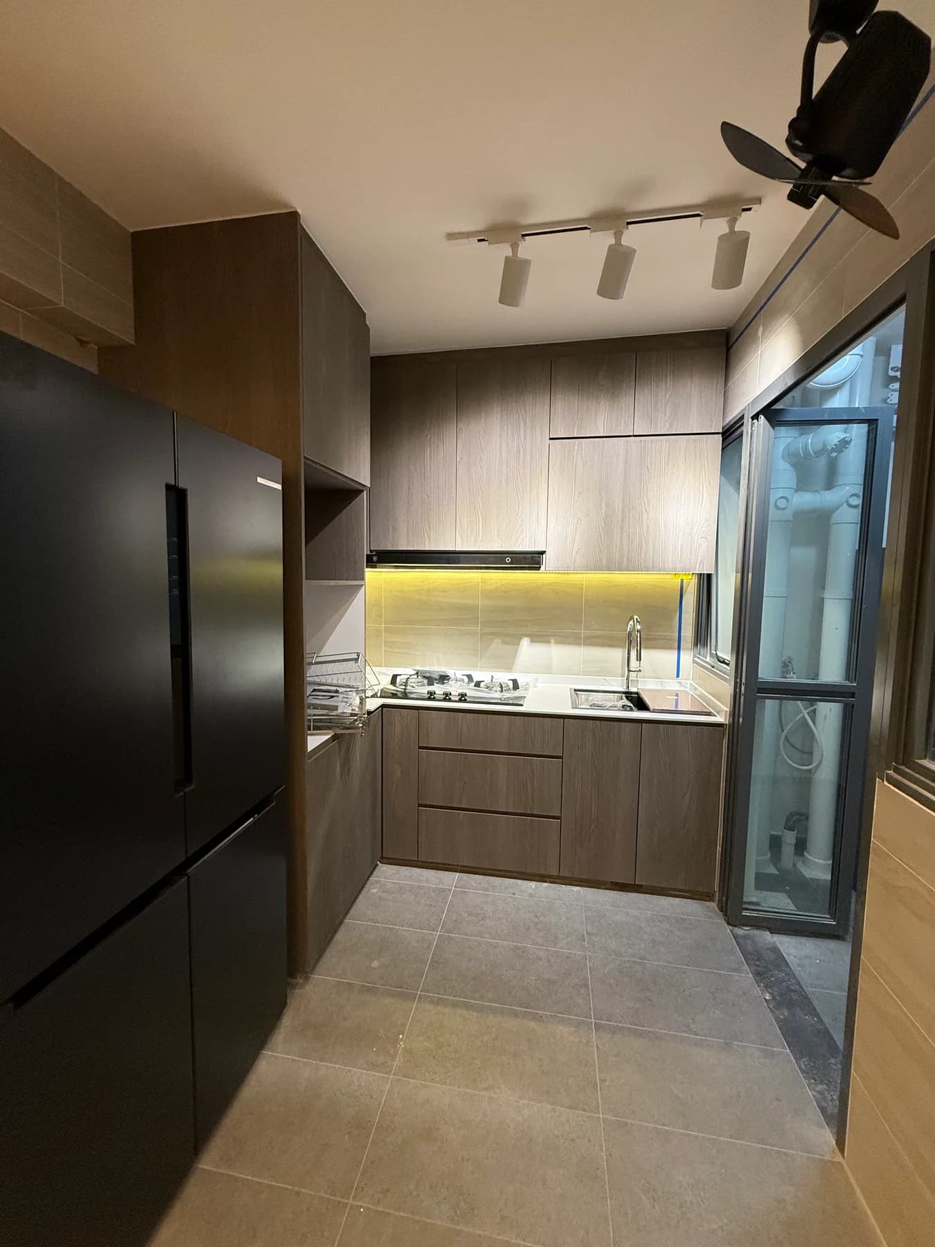 Completed compact Bartley BTO kitchen with built-in cabinets and island