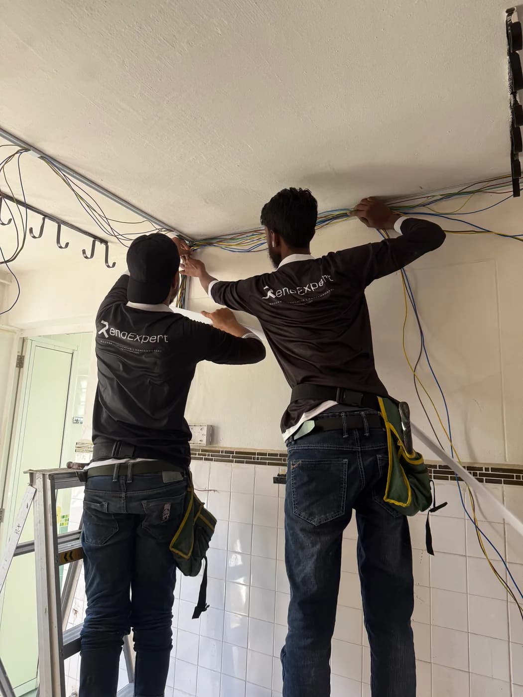 Electrical wiring work in progress during a renovation